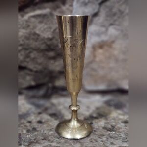 This is a vintage, hand-etched brass bud vase, from India. 